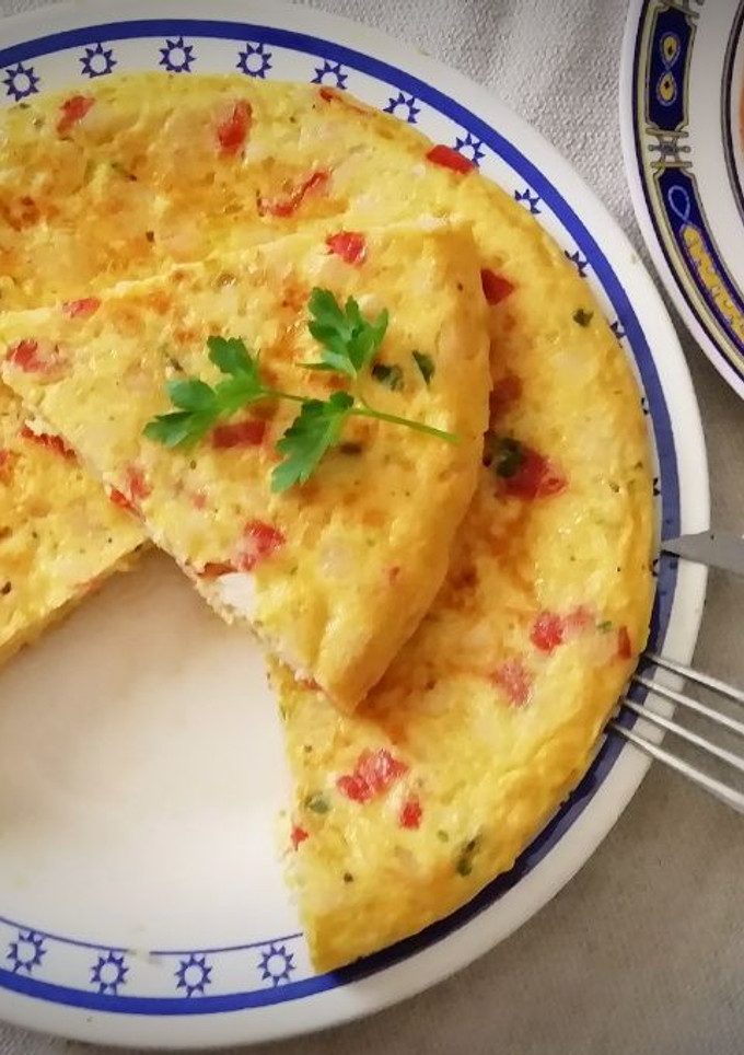 Una foto de Tortilla de Merluza con Piquillos