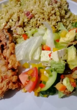 A picture of My best ever cauliflower rice, hake and salad.