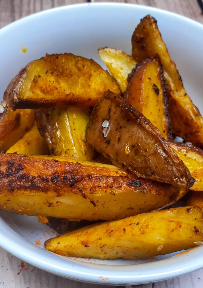 Una foto de Papas rústicas