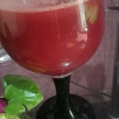 A picture of Carrot and pomegranate juice.