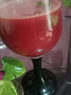 A picture of Carrot and pomegranate juice.