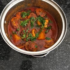 A picture of Egg Curry with Potato and Mushroom.