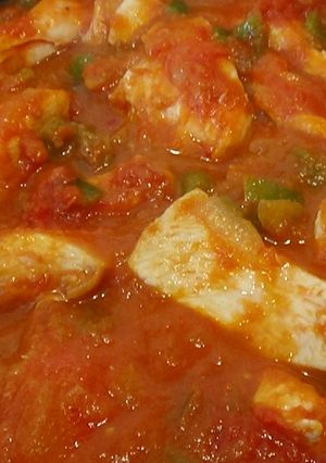 Una foto de Pollo con tomate