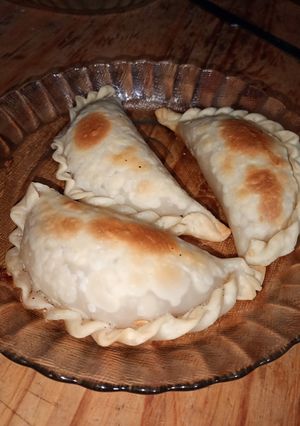Una foto de Empanadas de cebolla y queso