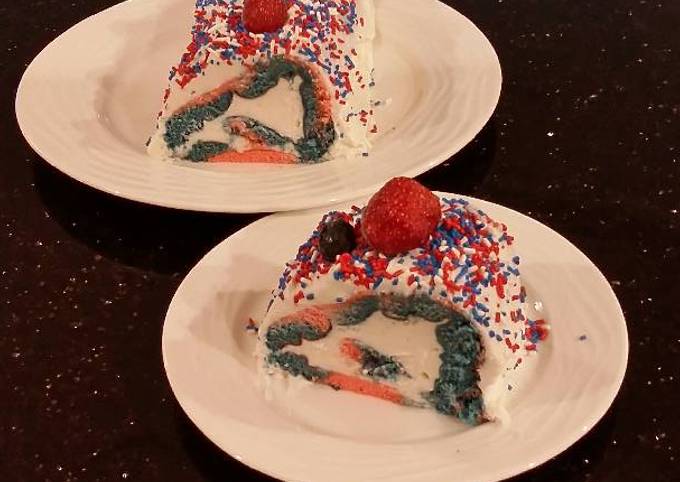 Patriotic Vanilla Cake Roll with Whipped White Chocolate Ganache Filling and Frosting