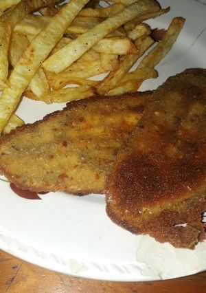 Una foto de Milas de berenjena 🍆 con fritas 🍟