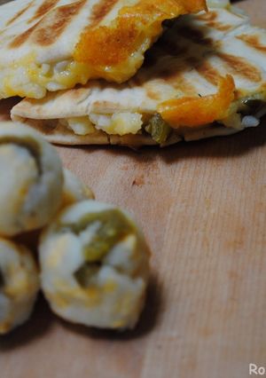 A picture of Mashed potato grilled sandwich with cheddar cheese.