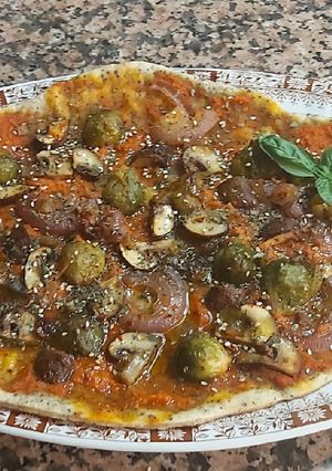 Una foto de Pizza verduras vegana