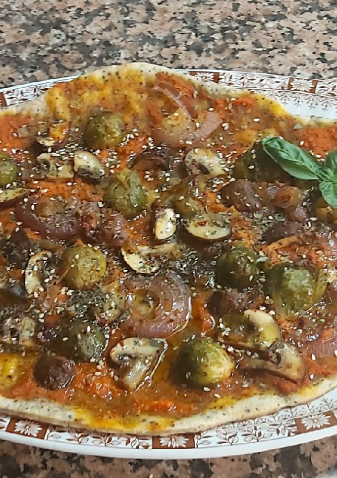 Una foto de Pizza verduras vegana