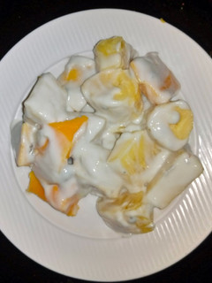 A picture of Fruits in yoghurt.