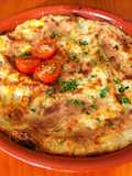 Lasaña de pollo asado, setas y queso curado