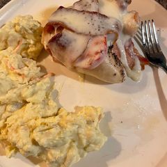 A picture of Caprese chicken with bacon.