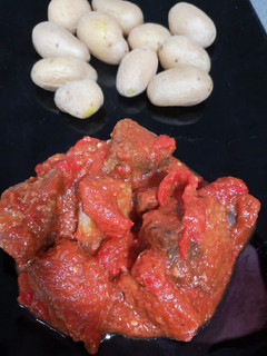 Una foto de Bonito con tomate