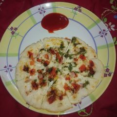 Rawa uttapam A picture of Rawa uttapam.