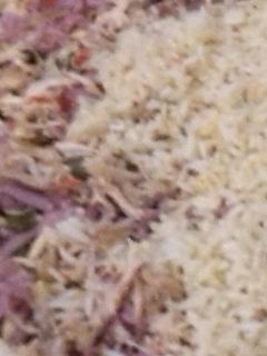 Una foto de Arroz con pollo escalonado