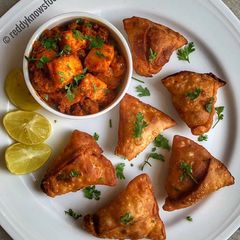 A picture of Spicy Paneer Masala Samosas.