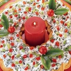 A picture of Brenda's Spinach Dip Crescent Wreath.