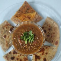 A picture of Achaari Sattu Paratha and Masala Moong Combo.