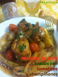 Una foto de Muslitos de pollo asados con tomatitos y champiñones