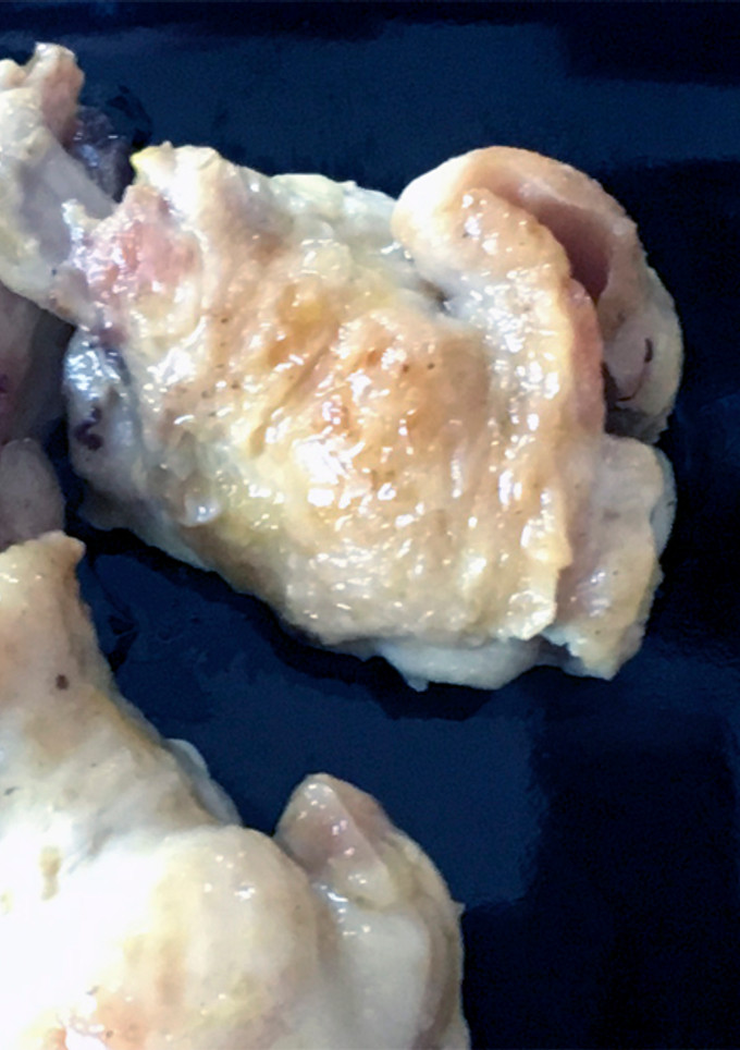Una foto de Alitas de pollo con manzana