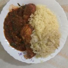 A picture of Rice and chicken stew with cabbage.