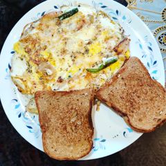 A picture of Toasted Bread with Onion Cheese Omelette..