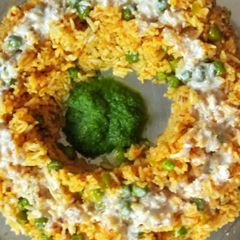 A picture of Peas Pulav With Chutney and Curd.
