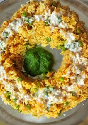 A picture of Peas Pulav With Chutney and Curd.