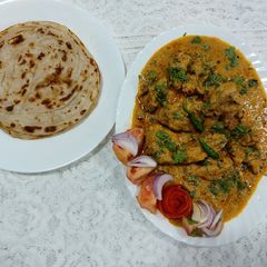 A picture of Reshmi chicken with cashwnut masala with warky paratha.