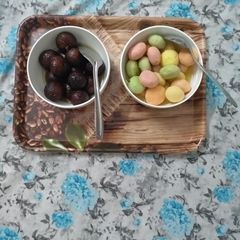 A picture of Rasgulla and gulab jamun.