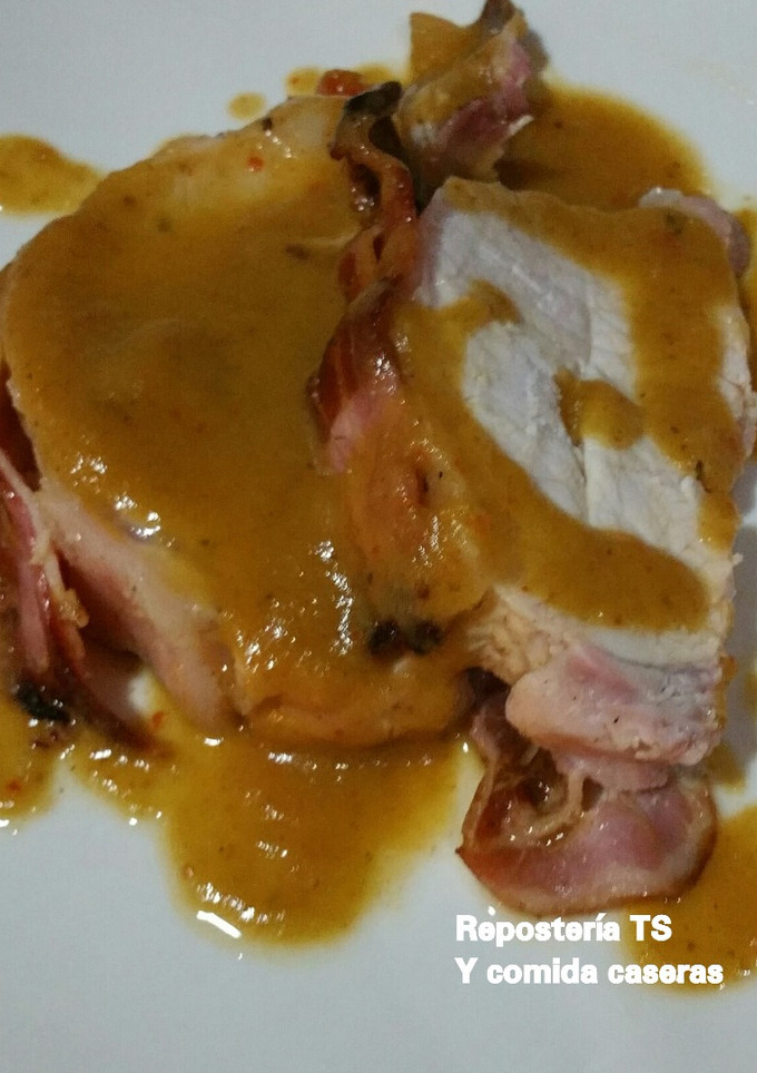 Una foto de Lomo al horno con bacon