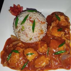 A picture of Chicken Vegetable Fried Rice With Shashlik.