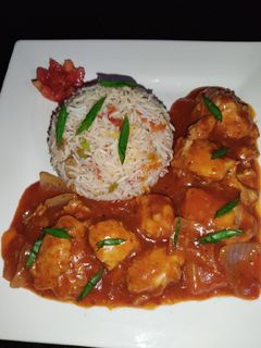 A picture of Chicken Vegetable Fried Rice With Shashlik.