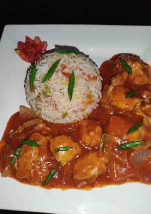 A picture of Chicken Vegetable Fried Rice With Shashlik.