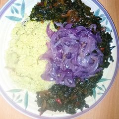 A picture of Couscous and tree spinach sauce.