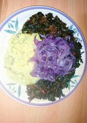 A picture of Couscous and tree spinach sauce.