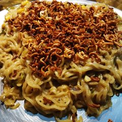 Creamy Corn and Capsicum Maggie with Maggie crisps A picture of Creamy Corn and Capsicum Maggie with Maggie crisps.