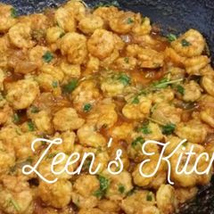 A picture of Achari Prawns.