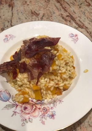 A picture of Butternut squash risotto with crispy coppa.