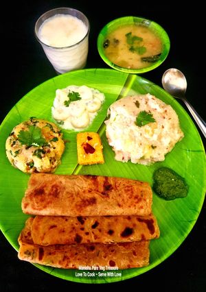 A picture of Vrat Farali Thali: Potato Peanut Kadhi, Barnyard Khichdi, Rajgira Potato Paratha, Potato Sabzi.