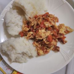 A picture of Fried Eggs with Ugali.