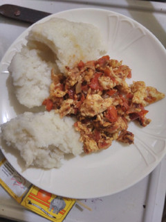 A picture of Fried Eggs with Ugali.