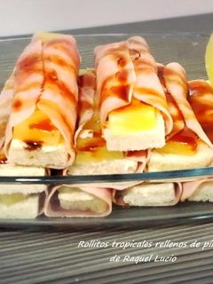 Una foto de Rollitos tropicales envueltos en York