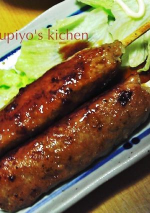 A picture of Skillet Teriyaki Chicken Tsukune with Chopsticks.