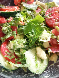 A picture of Lettuce cucumber avocado salad.