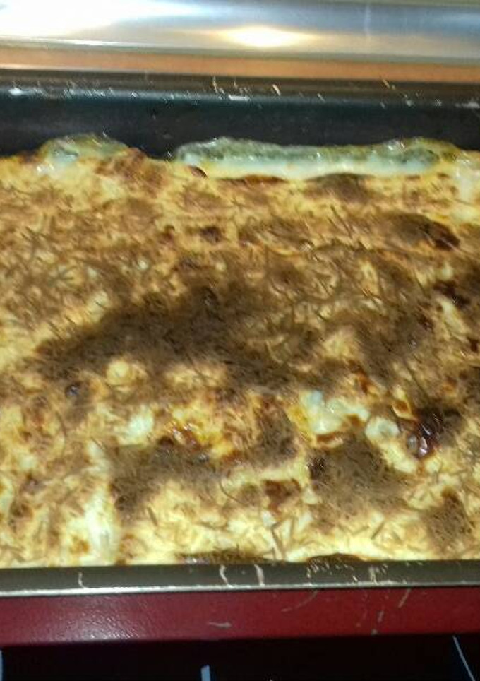 Una foto de Lasaña gratinada