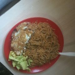 A picture of Fried spaghetti with eggs.