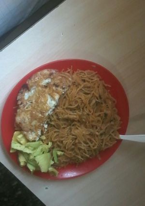 A picture of Fried spaghetti with eggs.
