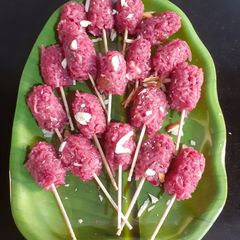 A picture of Coconut Beet lollipops.