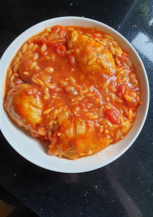 A picture of Chicken Thighs with Orzo Pasta.